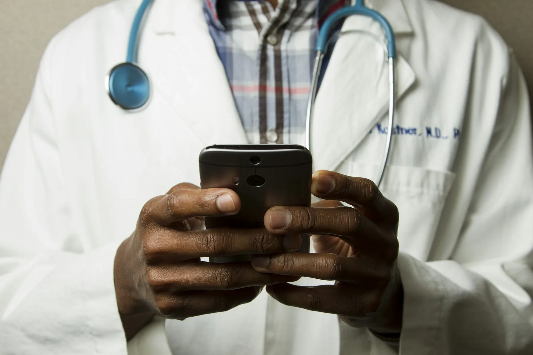 Physician speaking with a patient in a modern medical practice